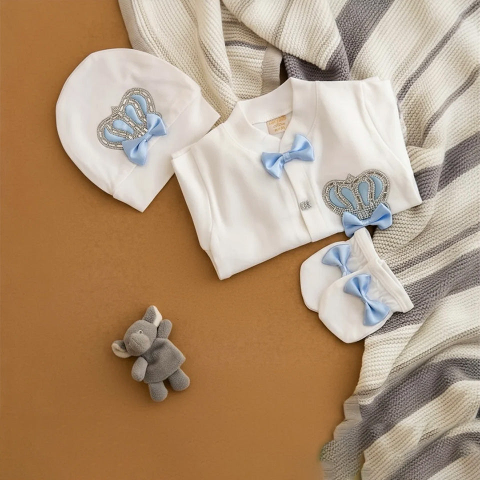 Luxury newborn baby outfit with crown embroidery, blue bows, and matching hat and booties