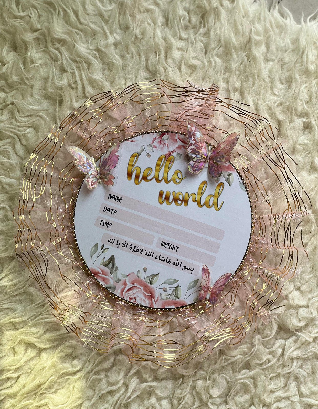 Hello World baby announcement card with pink butterflies and gold accents on fluffy background