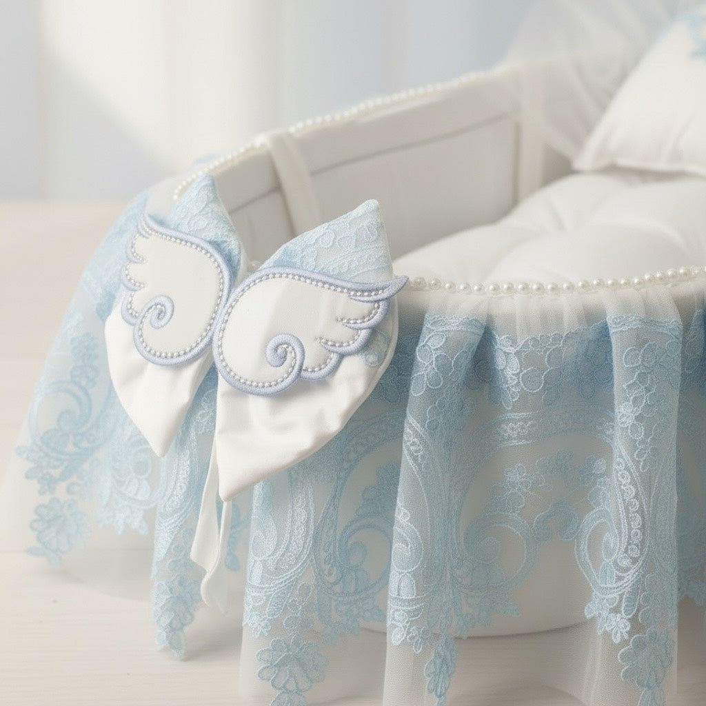 Delicate baby bassinet with lace trim and angel wing bow, perfect for newborns