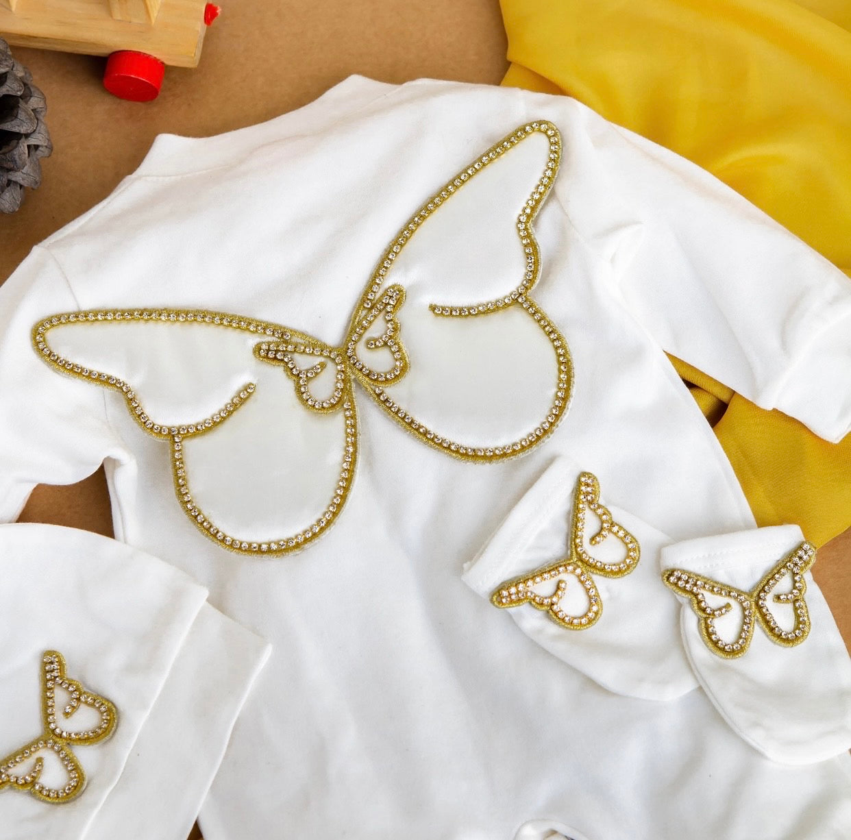 White baby onesie with gold butterfly rhinestone design, luxury newborn outfit