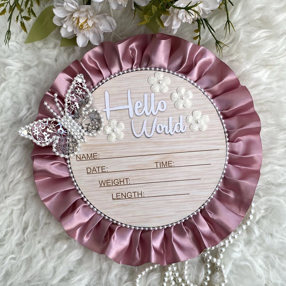 Hello World baby announcement plaque with pink satin ruffle and lace butterfly decoration