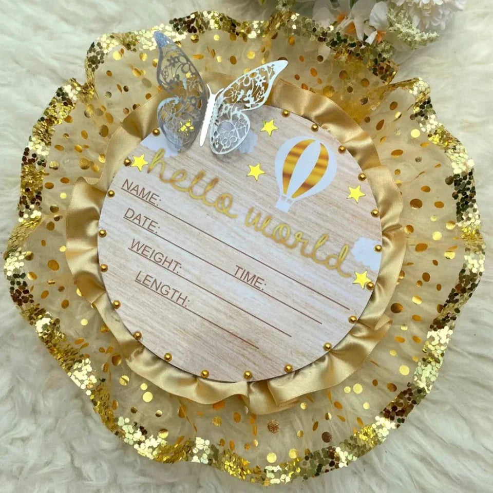 Hello World baby announcement plaque with gold glitter, butterflies, and hot air balloon design