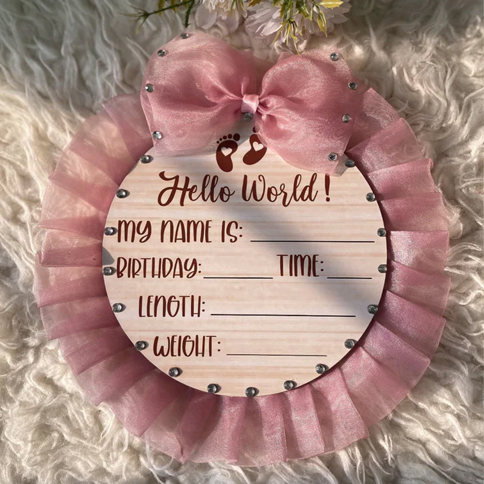 Pink baby birth announcement sign with 'Hello World' and fill-in details, perfect for newborn photoshoots