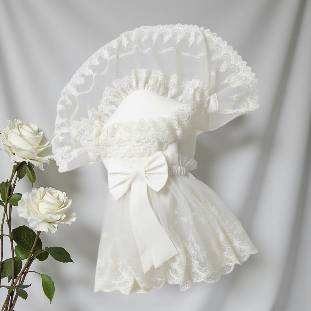 Elegant white lace baby dress with bow and veil, perfect for newborns and special occasions